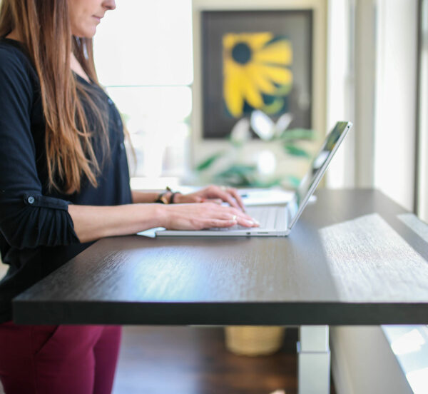 Woman working at standing desk